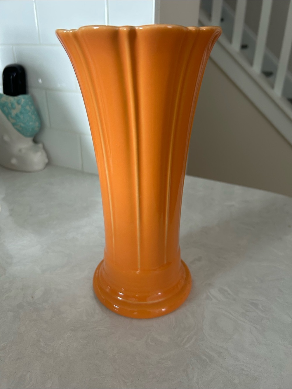 The fiesta retired medium tangerine flower vase